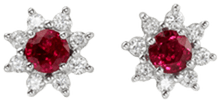 Ruby earrings with diamonds set in a halo setting design in platinum